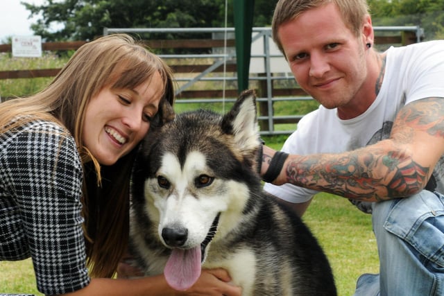 Volunteers Mark Hawes and Chloe Thorpe with RSPCA rescue dog Marley in 2014