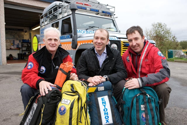 Pictured Eric Needham  Vice President, Buxton Mountain Rescue, James Glover Member services Director, HealthSure and Mark Williams Deputy Team Leader, Buxton Mountain Rescue in 2008