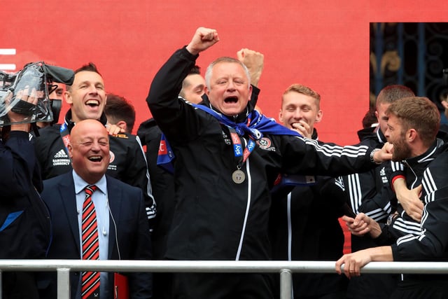 A delighted Wilder leads the celebrations during the promotion parade in Sheffield city centre to toast United's promotion back to the top flight in May 2019.