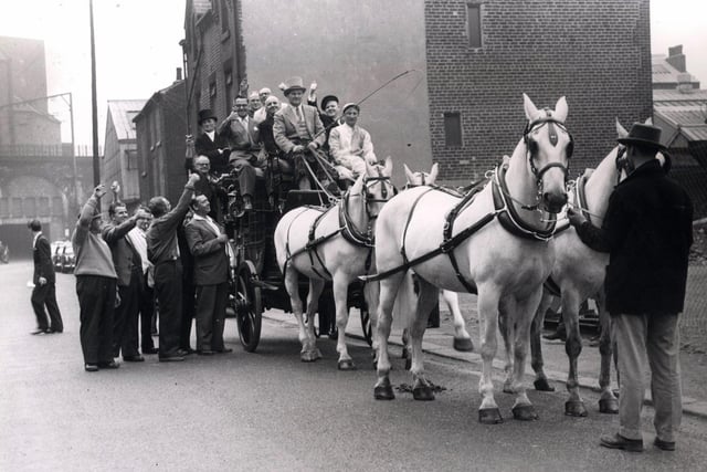 Sheffield taxi owners prepare to move off from Stanley Street by coach and horses for a protest procession, June 1960