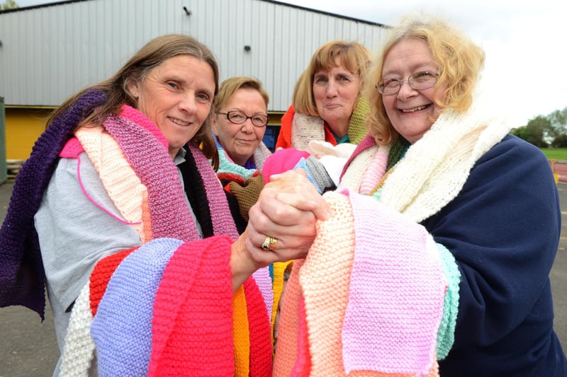Hundreds of scarves were knitted to hand over to the Shoebox Appeal in 2015. Pictured are Anne Walsh, Helen Frame,Trisha Octon and Carol Hall but who can tell us more?