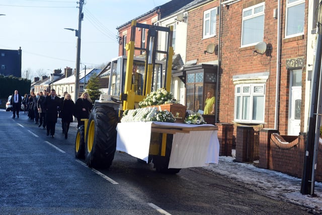 Timber merchant Tony Carr's coffin was carried to his funeral as per his wishes on the family's forklift truck at All Saints Church, Wheatley Hill.