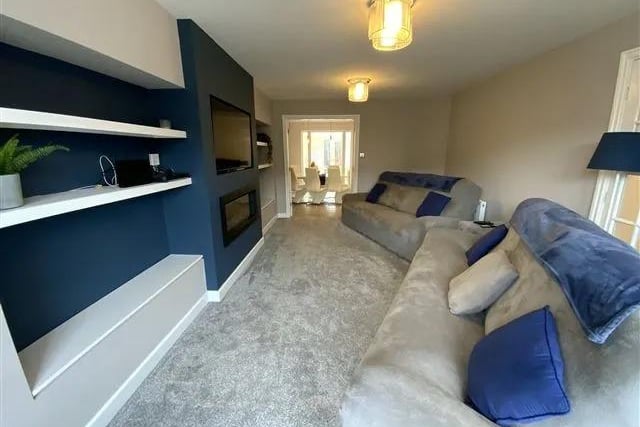 The lounge is large and has plenty of room for large sofas to fit all the family.