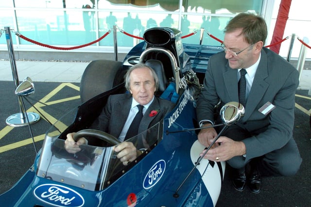Sir Jackie Stewart at the wheel of his 1971 Grand Prix winning Tyrrell Ford Formula One car, with Terry Hodgkinson, Chair of Yorkshire Forward,  at the opening of Oxford Innovation Ltd., at the Advanced Manufacturing Park, Catcliffe.  2 November 2006