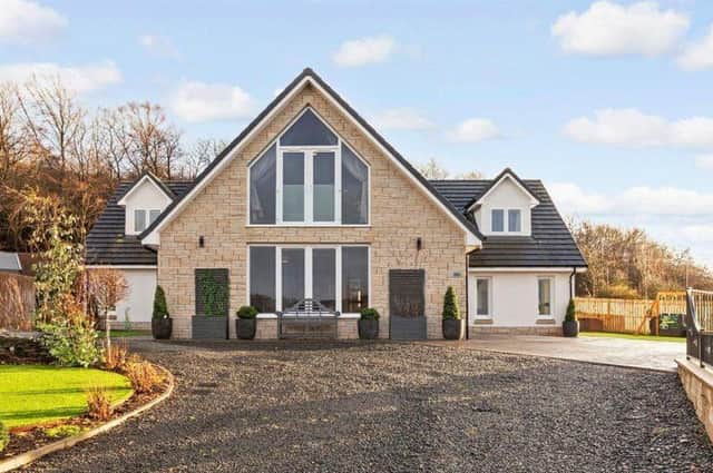 Cedar House is the middle of the three luxury homes within the private gated development.