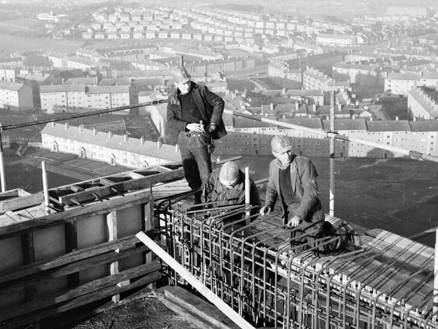Housing at Castlemilk - Glasgow - Men at work on 20 storey multi flats.
