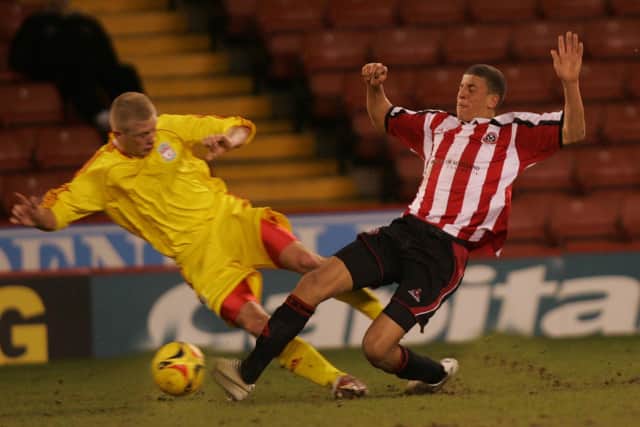 Sheffield United's goalscorer Kyle Walker with Liverpool's Robbie Threlfall in the FA Youth Cup Quarter Final in 2007
