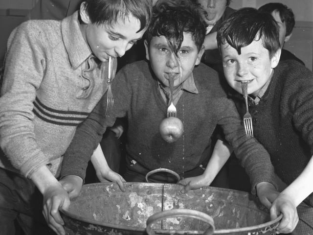 The Tweedie Memorial Boy's Club Hallowe'en party showing boys dookin' for apples in 1967.