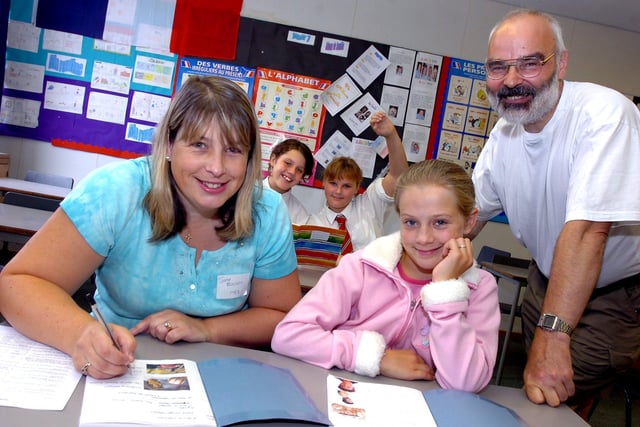 Hungerhill School, Edenthorpe, was 30 years old in 2006. Our picture shows shows teacher Bob Kiddle, aged 57,who has been at the school since it opened, with former pupil Jane Thackray, aged 40, a pupil at Hungerhill from 1978 to 1982,  her daughter Jessica Thackray, aged 11, and two other present day pupils Laura Breame (back, left), and Bethany Smithurst, both aged 12.