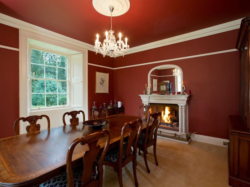 That dining room is worthy of a murder mystery dinner party.
