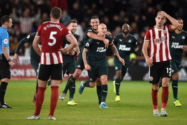 United stopped when a linesman flagged for offside but Jonjo Shelvey carried on and put the ball in the net. VAR ruled there was no offside, so the goal stood. (Photo by OLI SCARFF/AFP via Getty Images)