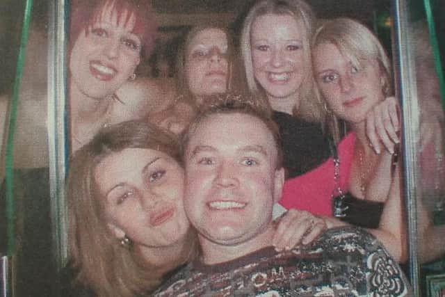 Club DJ Martin 'Cheggers' Wright with fans at Kingdom in Sheffield