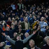 Jubilant Sheffield Wednesday fans celebrate their side's 2-0 win over Leeds United at Elland Road. Photo: Steve Ellis