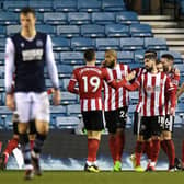 Sheffield United's Oliver Norwood celebrates scoring his side's second goal of the game during the FA Cup fourth round match at The Den, London: Kirsty O'Connor/PA Wire