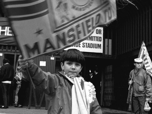 Waving his flag for the mighty Stags outside the ground.