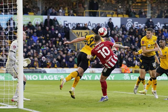 Sheffield United captain Billy Sharp has an effort rulked-out for a high boot towards the end of the first half at Wolverhampton Wanderers: Andrew Yates / Sportimage