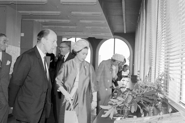 A final picture of the royal visit in June 1964, with the Queen touring the Botanics' botany labs.