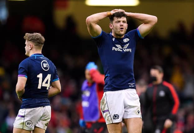Scotland’s Blair Kinghorn appears dejected after the final whistle of the Guinness Six Nations defeat to Wales at the Principality Stadium, Cardiff.
