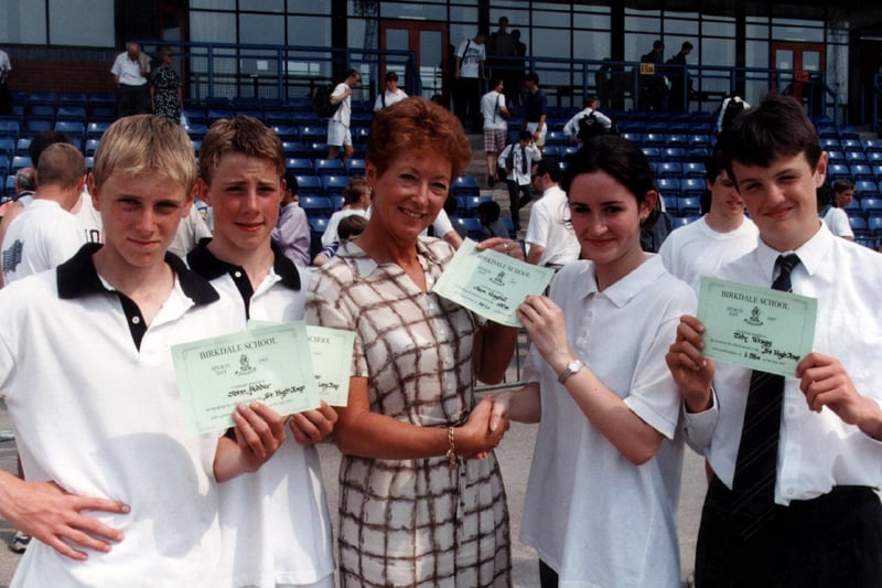 Birkdale pupils receive certificates from former Olympic champion Ann Brightwell, nee Packer, at the school's sports day (July 1997)