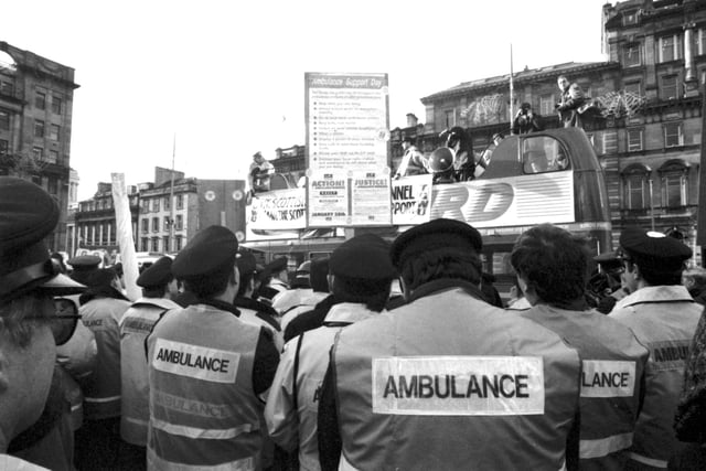 A demonstration and rally to support the ambulance workers' strike gathers in George Square Glasgow, January 1990.