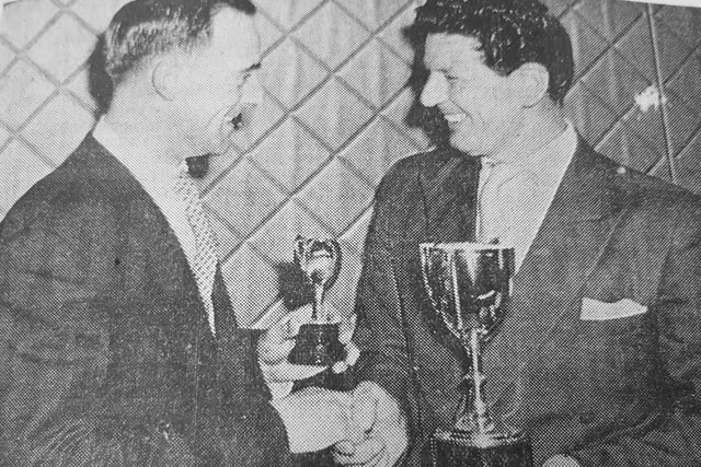Hibs goalie Ronnie Simpson made the presentations at Kirkcaldy Travel Club for dominoes, darts and cribbage.
Mr McKerrow is pictured receiving the darts trophy.
