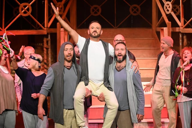 Darren Lewis (Jesus) gets a lift in Alnwick Stage Musical Society's production of Jesus Christ Superstar at Alnwick Playhouse in October 2021.
