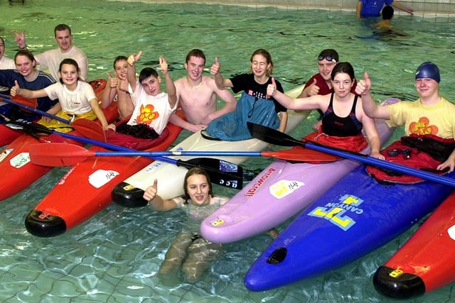 Cassandra Slater (in the pool), aged 15, of Kirk Sandall, who organised the canoe rolls for Children in Need lines up with those who took part the event Don Valley School's swimming pool back in 2002