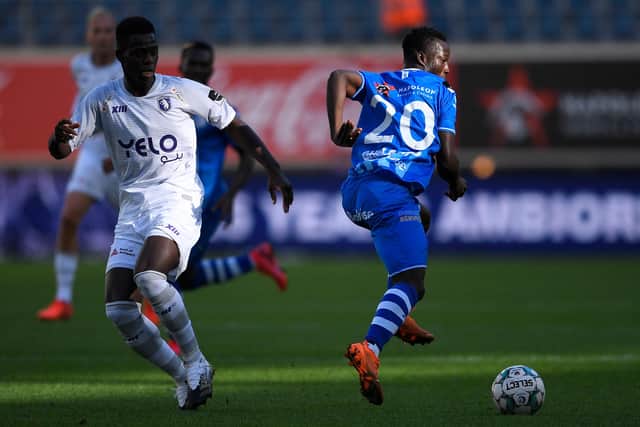 Beerschot's Ismaila Coulibaly and Gent's Osman Bukari fight for the ball  (Photo by YORICK JANSENS/BELGA MAG/AFP via Getty Images)
