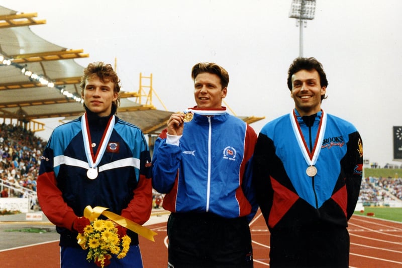 Men's javelin winner and GB team captain Steve Backley with silver medallist Vladimir Ovchinnikov of Russia, left, and bronze medallist K Hempel (Germany) at the 1991 World Student Games. Ref no: u06166