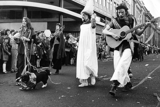 Sheffield University - Rag Day in October 1972 where the dog leads the way for this group in the parade.