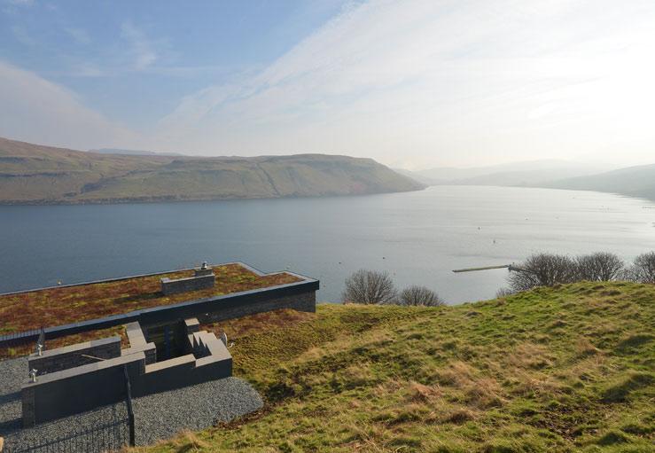 The grass roof is one of a number of eco-friendly features.