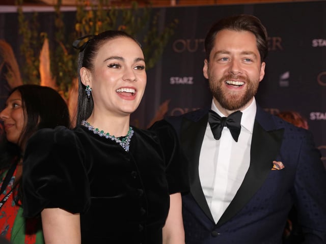 Sophie Skelton and Richard Rankin (Brianna and Roger) attend the Outlander Season Six premiere in London.