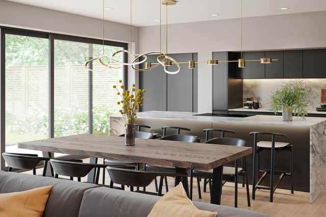 "This fabulous free-flowing space is perfectly suited to the modern lifestyle," says the brochure, "showcasing a contemporary kitchen with signature silestone worktops, a range of integrated Siemens appliances, Quooker hot tap and Bora downdraft induction hob."