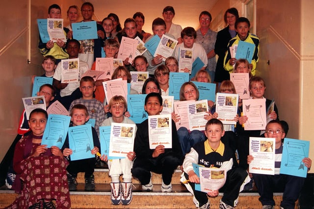Some of the pupils who attended the Herries School Summer School with their certificate in 1998