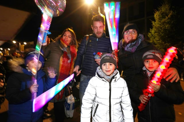 The Lloyd and Wells families at the Christmas lights switch on in Palmerston Road, Southsea. Picture: Chris Moorhouse (251121-34).