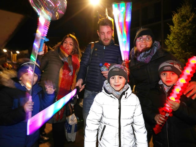 The Lloyd and Wells families at the Christmas lights switch on in Palmerston Road, Southsea. Picture: Chris Moorhouse (251121-34).