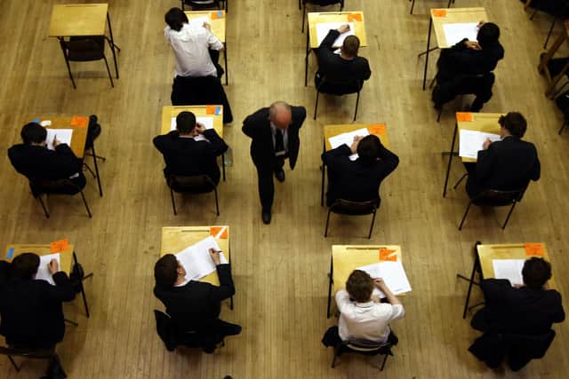 Secondary school pupils sitting an exam (photo: David Jones/PA Wire).
