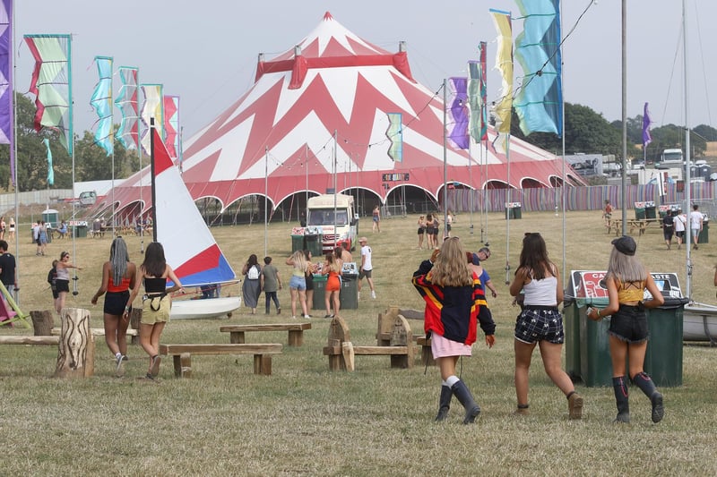 Fans entering the arena area after gates opened on the first day of the festival