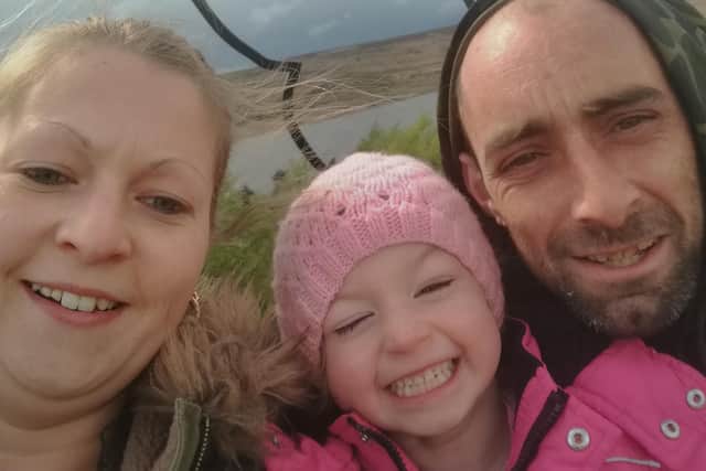 Amy Bradshaw pictured with her partner and seven-year-old daughter Faith