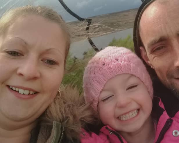 Amy Bradshaw pictured with her partner and seven-year-old daughter Faith