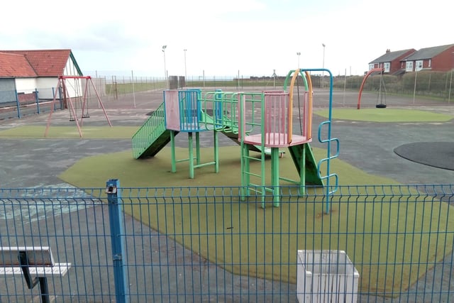 This play park would usually be full of children playing and swinging on the swings during their days off school.