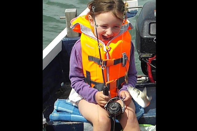 2015 Winner. Darcey's big catch of the day!
My Granddaughter Darcey on her first fishing trip and catching her first fish! We were in Chichester harbour just for a ride out to see how she liked being on the boat and took a small rod for her to try. She was delighted with her 'catch' and was quite happy to throw it back and said she'll catch it again when it's bigger!