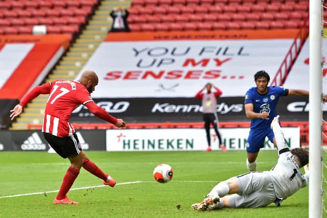 David McGoldrick kncoks in his first ever Premier League goal and the opener for Sheffield United as they beat Chelsea 3-0 (Photo by PETER POWELL/POOL/AFP via Getty Images)