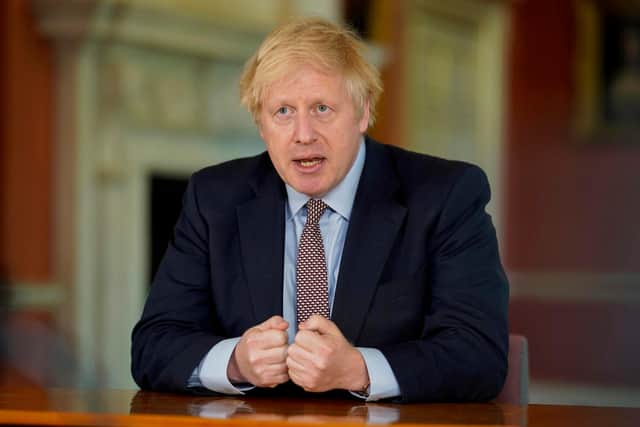 Britain's Prime Minister Boris Johnson records a televised message to the nation (Photo by No 10 Downing Street via Getty Images)