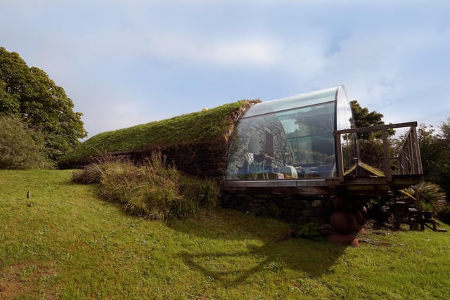 The unique building has a turfed roof, helping it blend into the landscape