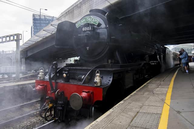 The Flying Scotsman at Paddington Station in London last June - trainspotter Ray Hill from Rotherham managed to get on the footplate as a youngster
