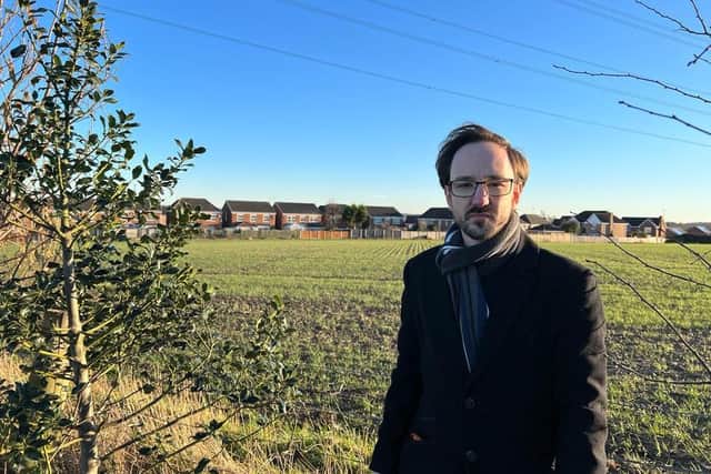 Coun Kurtis Crossland, who represents Beighton ward on Sheffield City Council, at the proposed traveller site off Eckington Way. Coun Crossland was one of the politicians who objected.