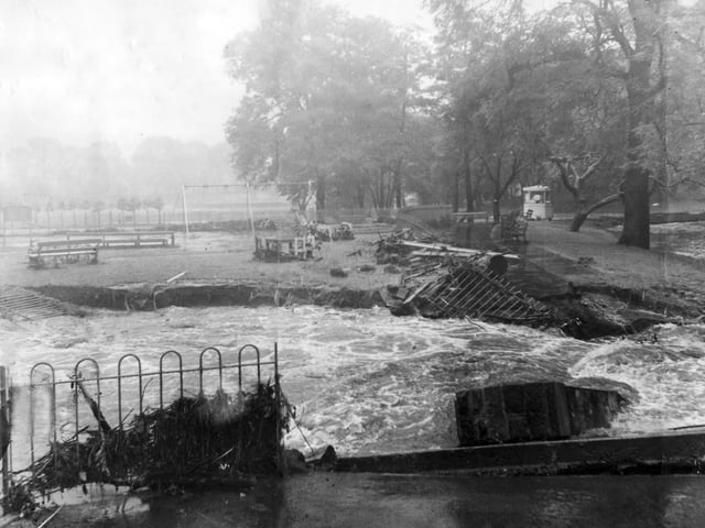 Damage caused by flooding in Millhouses Park on July 2, 1958. This picture shows the remains of a bridge which spanned the river before the deluge.