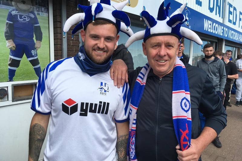 Adam Garrington (left) and family friend Kevin Braithwaite wore hats they also wore to 2005's play-off final at Cardiff.