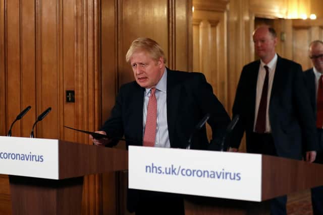Prime Minister Boris Johnson arrives at a news conference inside 10 Downing Street, London, after the latest COBRA meeting to discuss the government's response to coronavirus crisis. PA Photo. Picture date: Thursday March 12, 2020. See PA story HEALTH Coronavirus. Photo credit should read: Simon Dawson/PA Wire
